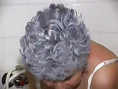 Hot old lady Rosa climbs in the shower cabin and is eager to piss. After finishing pissing, she turns on the shower and starts cleaning herself a little and especially that unshaved pussy of hers. She is all wet but wipes with a towel her filthy cunt. The bitch is one piece of a sexy lady! Check it out.